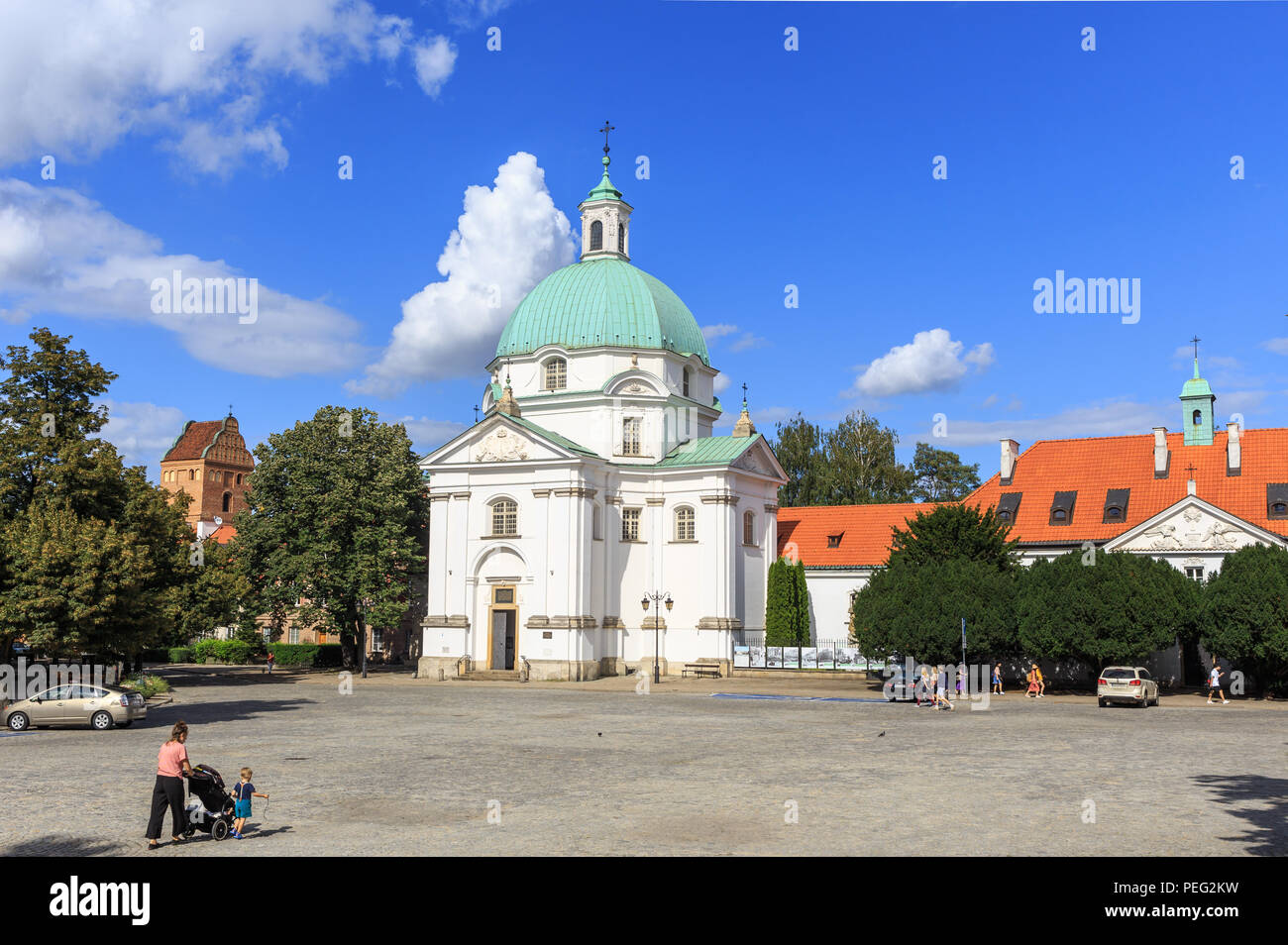 New Town Square with baroque church of St. Kazimierz, designed by Tylman Gameren and monastery complex  Benedictine Sisters with small baroque palace Stock Photo