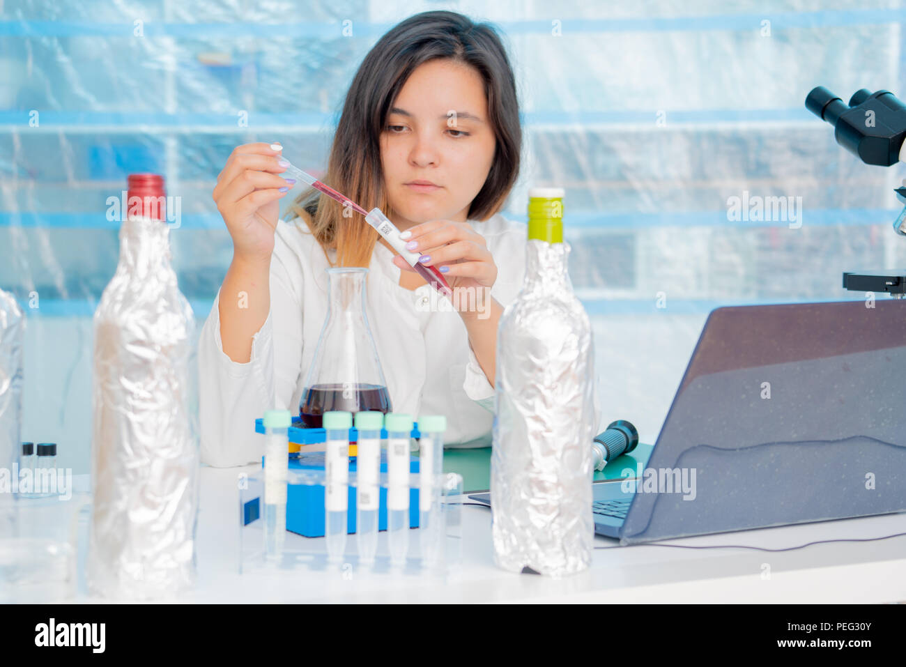 Food inspection, lab, measurement of sugar content with Refractometer