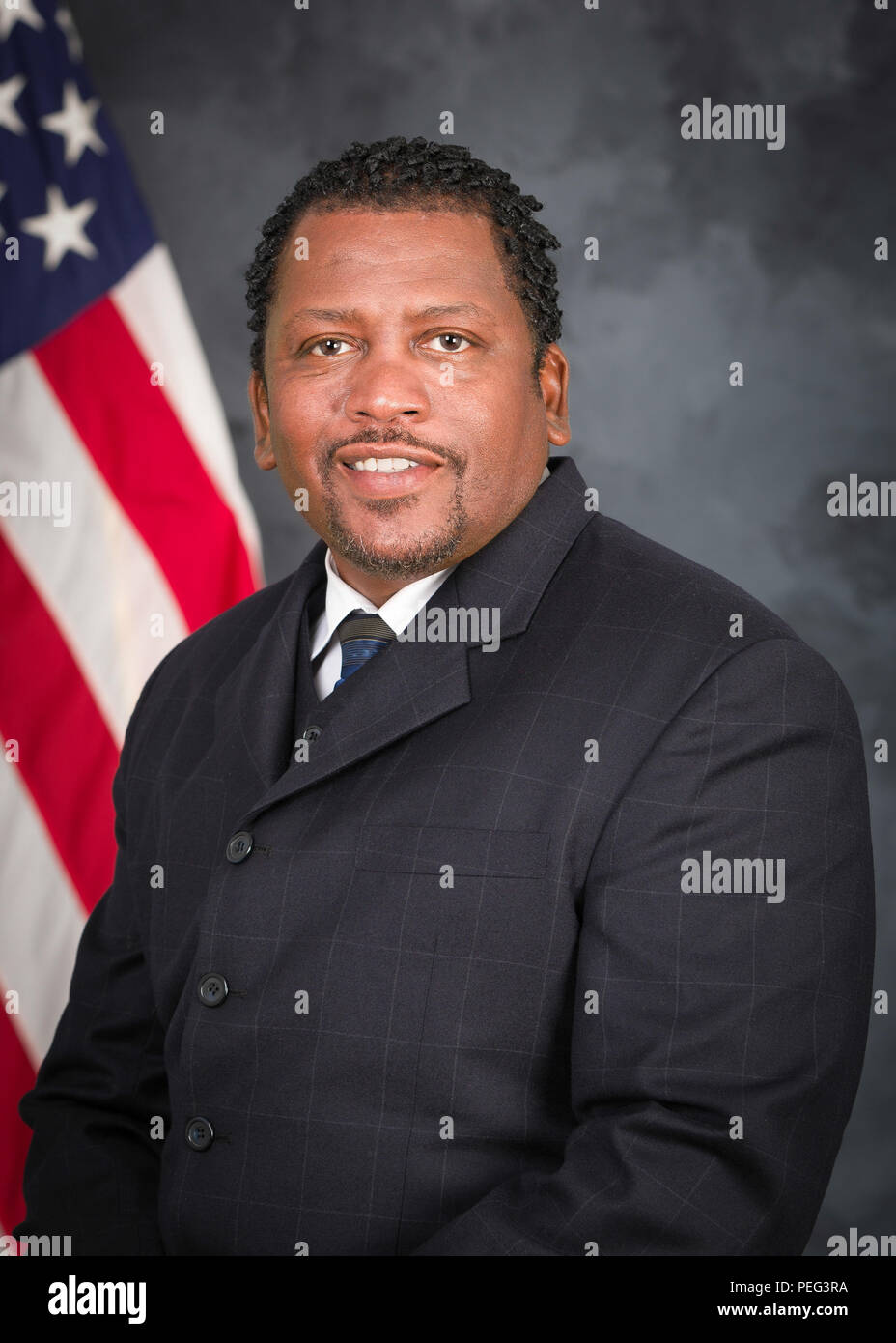 This is the official portrait of Management Analyst, Inspector General, Naval District