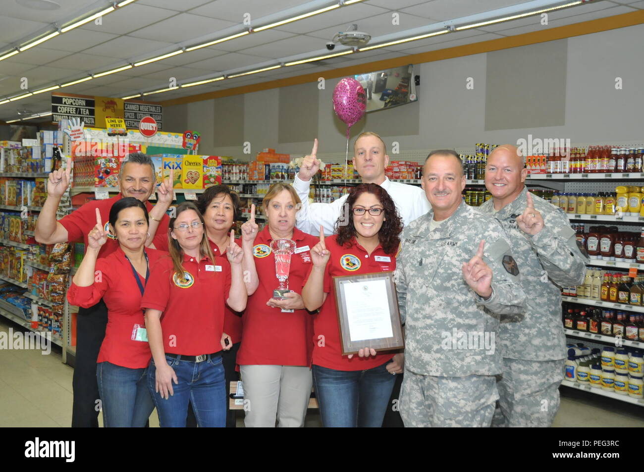 Fort Hunter Liggett, Calif., won the Richard M. Paget Award for the Best Small Commissary in the United States. From left, Store Manager David Flores, Head Bagger Delia Maguire, store associates   Barbara Hicks and Virginia Corpus, Grocery Manager Suzanne McKinley, Store  Associate Estella Murillo, Fort Hunter Liggett and Ord Community Commissary   Store Director Alex King, Command Sgt. Maj. Tracey Barlogio, Fort  Hunter Liggett Garrison Command Sergeant Major and Lt. Col. Michael B. Bailey, Fort Hunter Liggett Garrison Deputy Commander. (Army photo: Michael Guterl, Fort Hunter Liggett Public  Stock Photo
