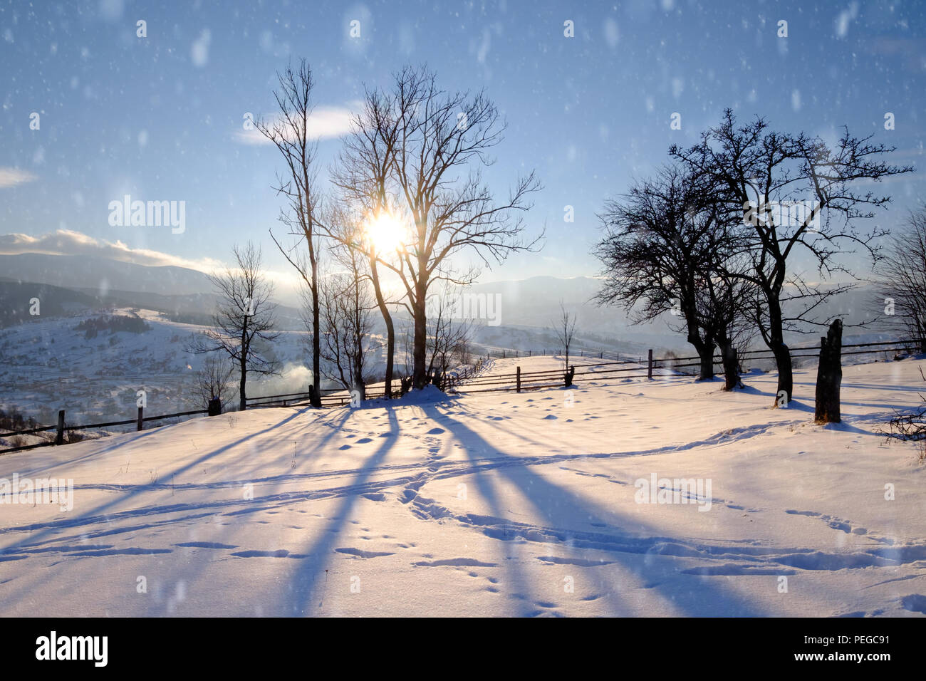 Sunrise light on snowy hills hi-res stock photography and images - Alamy