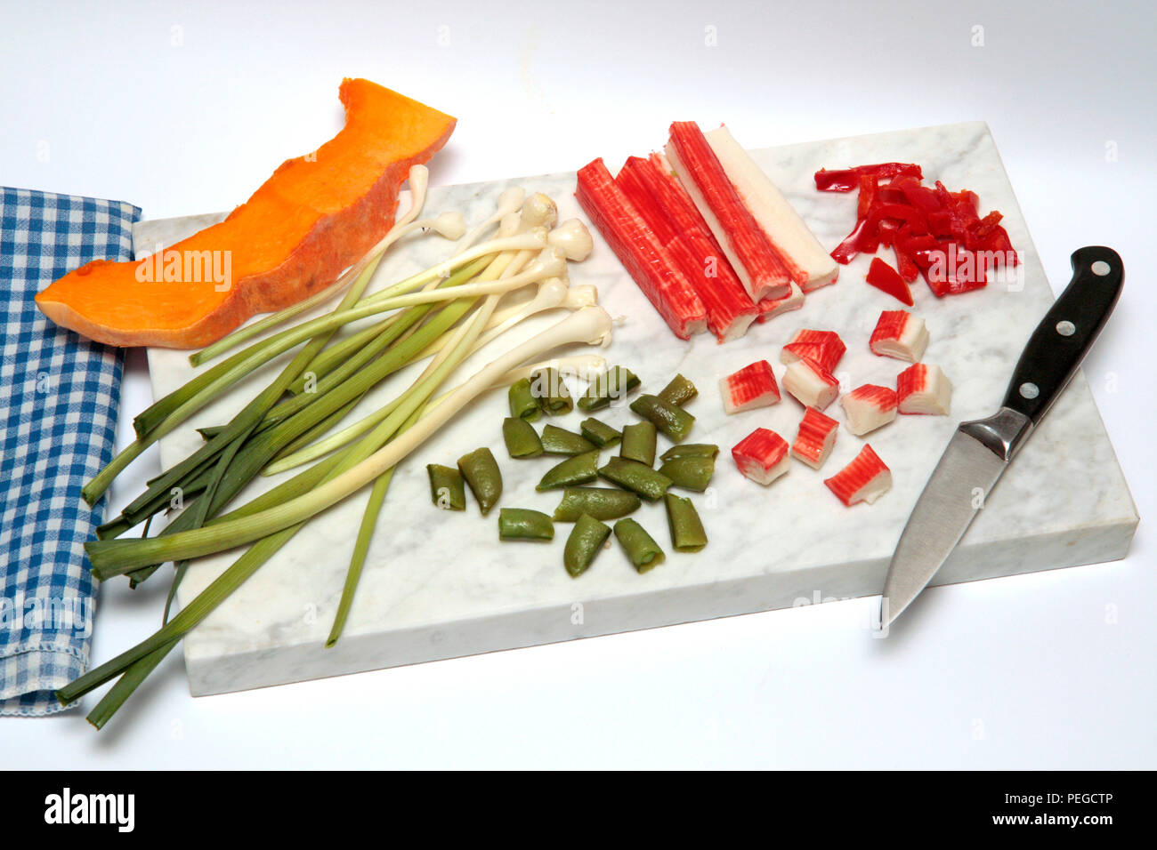 Wholemeal rice with surimi and vegetables. Step by step. Prepared dish