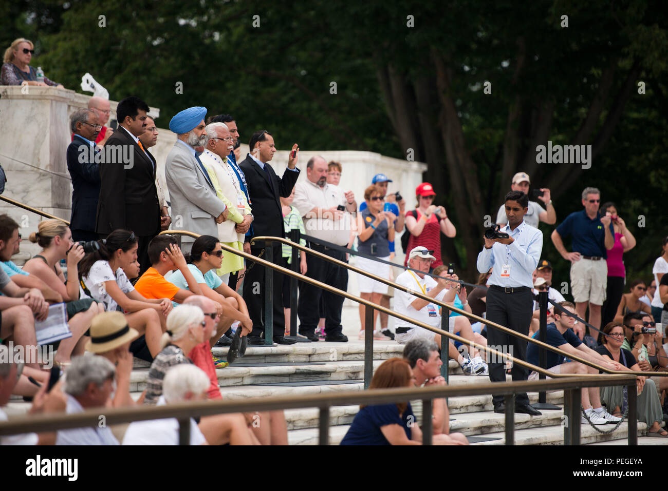 Chief Minister of Haryana, India Manohar Lal Khattar, along with others in the official party and other visitors, watch a Changing of the Guard ceremony at the Tomb of the Unknown Soldier in Arlington National Cemetery, Aug. 18, 2015, in Arlington, Va., immediately following a wreath-laying at the Space Shuttle Columbia Memorial. Kalpana Chawla, one of seven crew members killed during the Columbia disaster, was born in Karnal, India and was posthumously awarded the Congressional Space Medal of Honor, the NASA Space Flight Medal, and the NASA Distinguished Service Medal. (U.S. Army photo by Rac Stock Photo