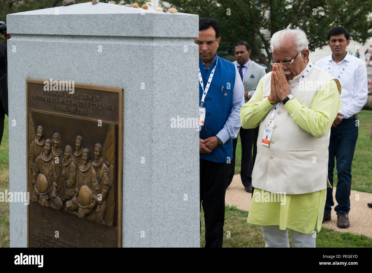 Chief Minister of Haryana, India Manohar Lal Khattar takes part in a wreath-laying ceremony at the Space Shuttle Columbia Memorial near the Memorial Amphitheater in Arlington National Cemetery, Aug. 18, 2015, in Arlington, Va. Kalpana Chawla, one of seven crew members killed during the Columbia disaster, was born in Karnal, India and was posthumously awarded the Congressional Space Medal of Honor, the NASA Space Flight Medal, and the NASA Distinguished Service Medal. (U.S. Army photo by Rachel Larue/released) Stock Photo