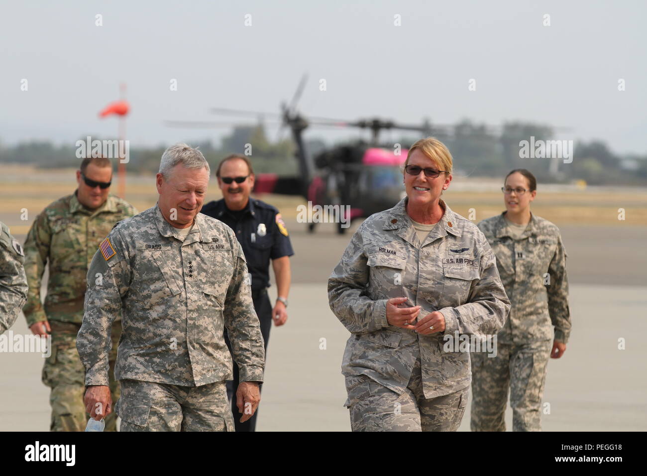 Cal Fire Operations Officer Jim Gonzalez Maj Kim Holman From The 146th Airlift Wing And Capt Synthia L Jones From B Company 1 126th Aviation Regiment Greet Gen Frank Grass The U S National