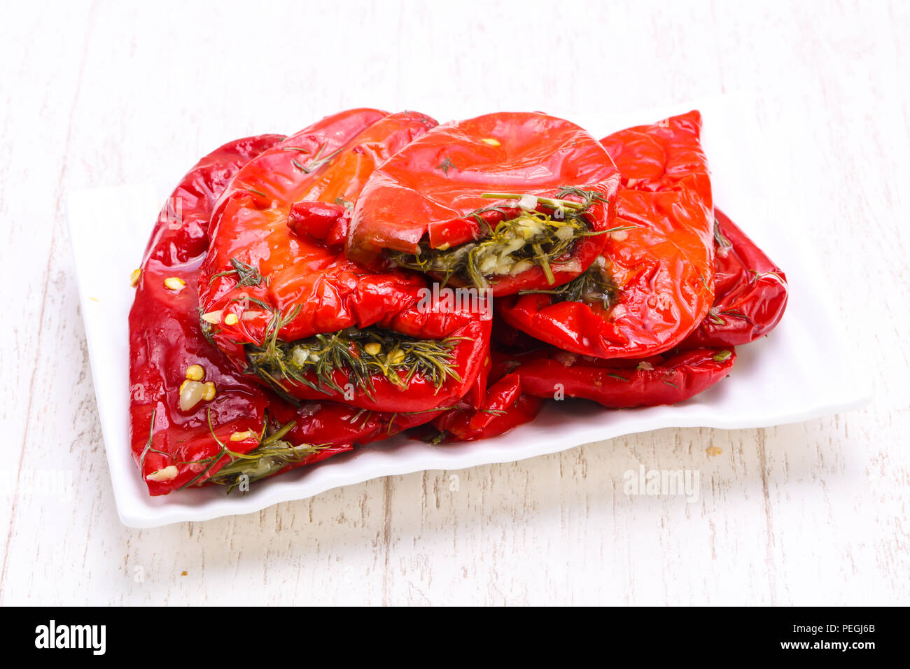 Pickled red bell pepper with dill Stock Photo Alamy