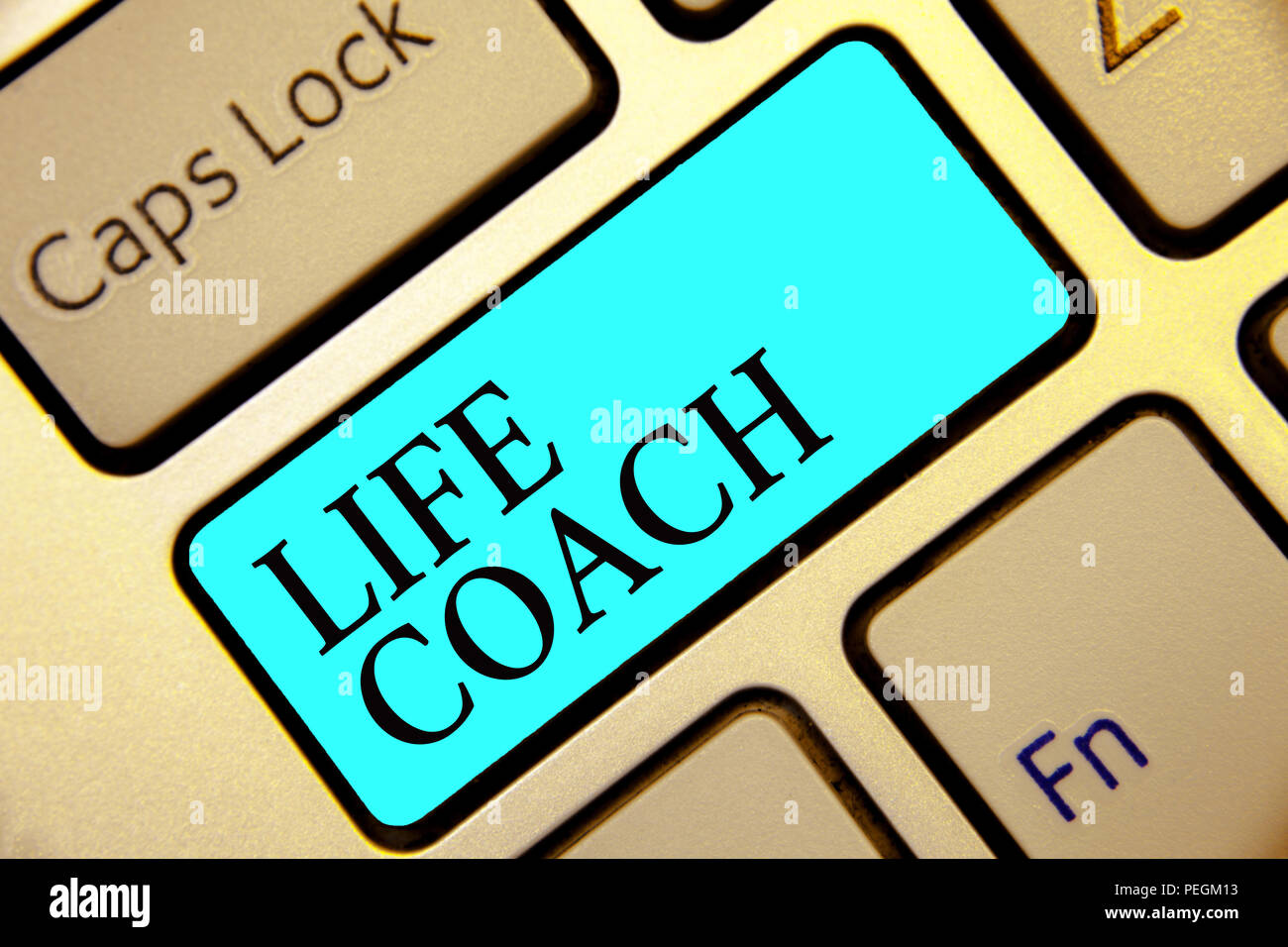 Writing note showing Life Coach. Business photo showcasing A person who advices clients how to solve their problems or goals Keyboard blue key Intenti Stock Photo