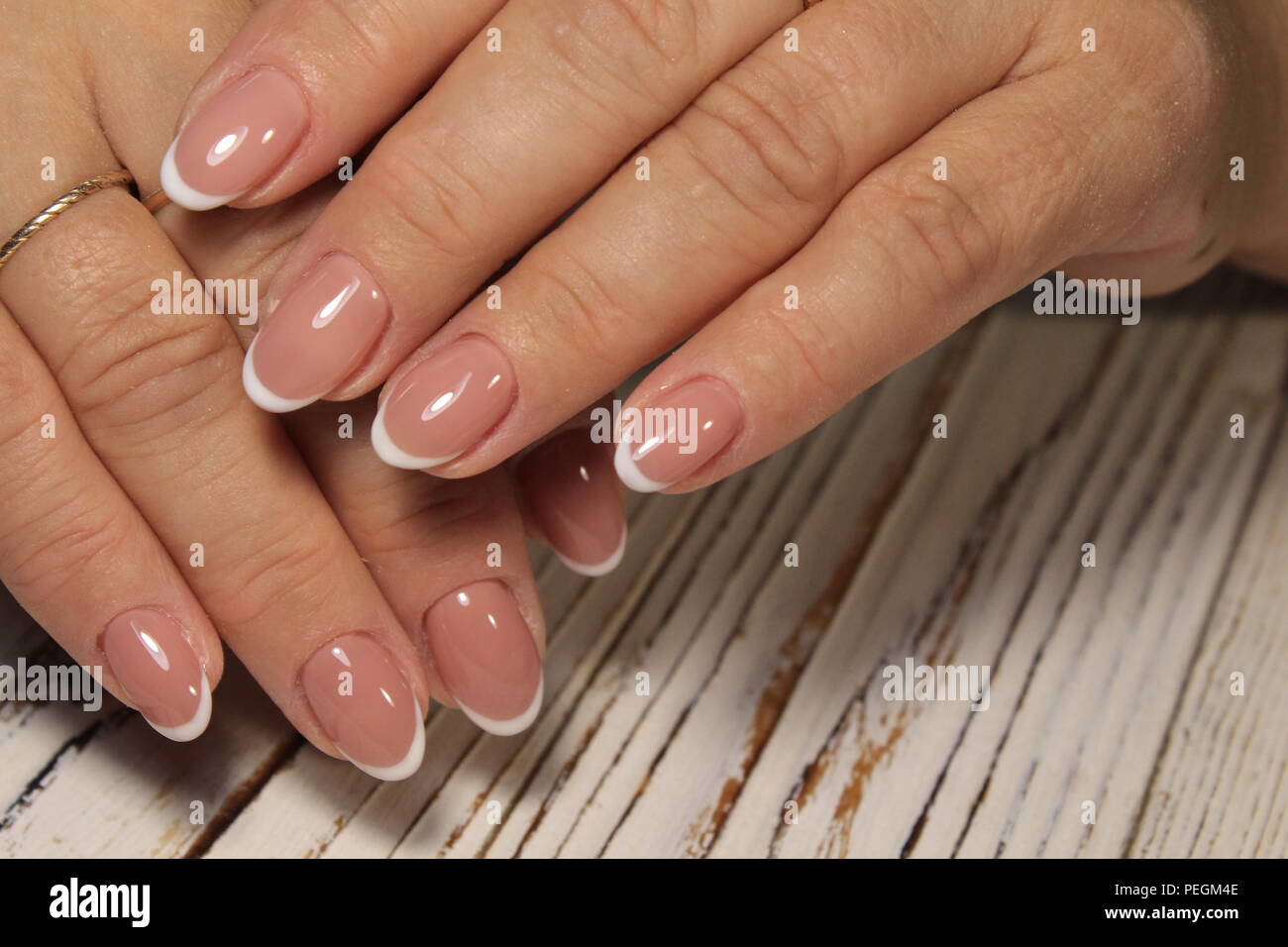 Hands with manicure. Natural with gel polish Photo - Alamy
