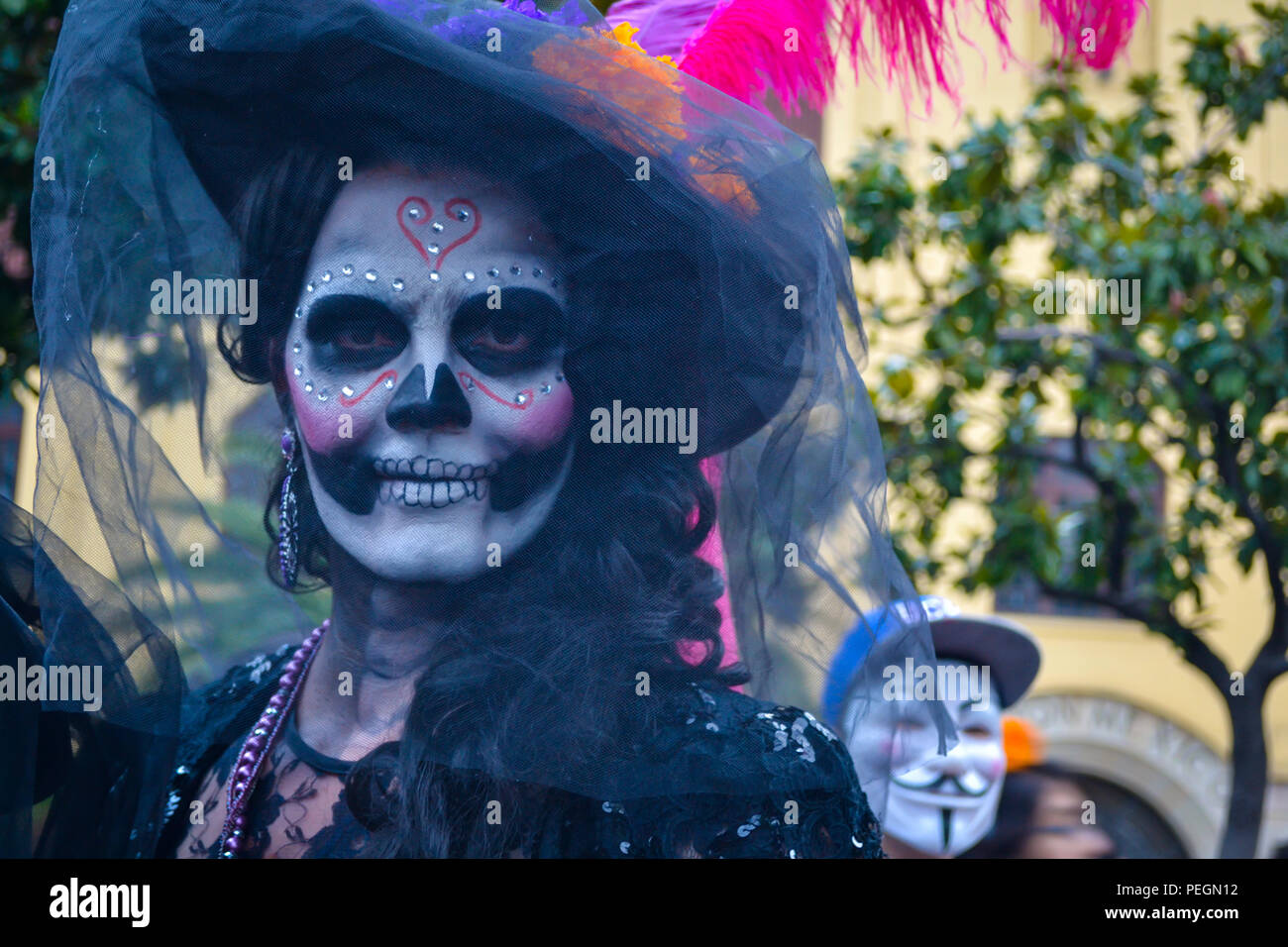 Mexico City, Mexico, ; November 1 2015: Portrait of a woman in disguise at the Day of the Dead celebration in Mexico City Stock Photo