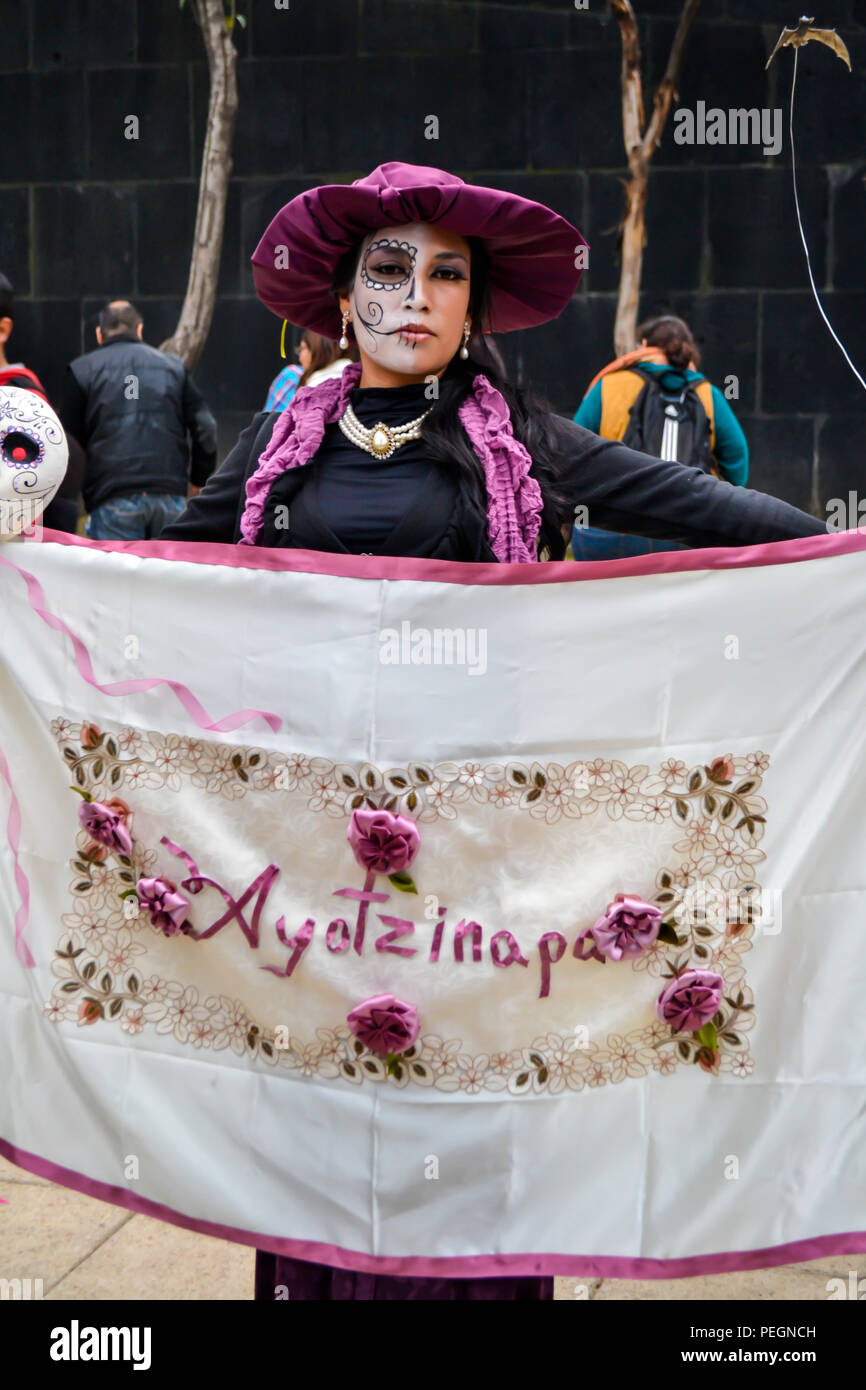 Mexico City, Mexico, ; November 1 2015: Woman with ayotzinapa at Day of the Dead celebration in Mexico City Stock Photo