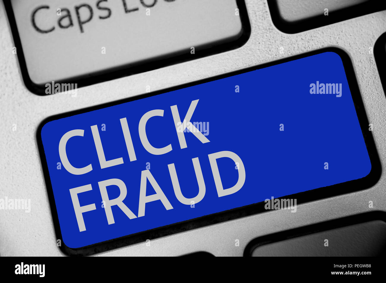Handwriting text writing Click Fraud. Concept meaning practice of repeatedly clicking on advertisement hosted website Keyboard blue key Intention crea Stock Photo