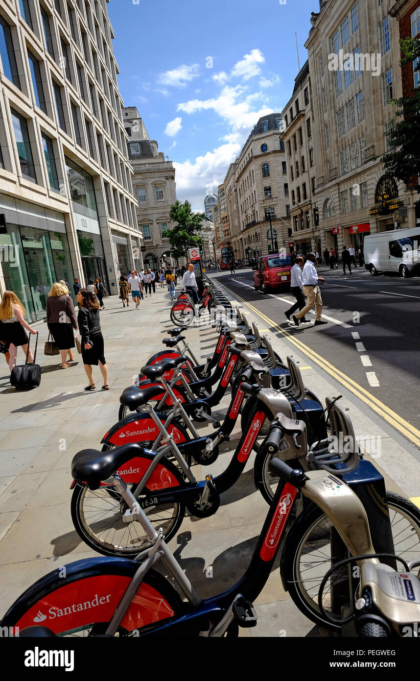 santander hire cycles parked on pavement, cheapside, london, england Stock Photo