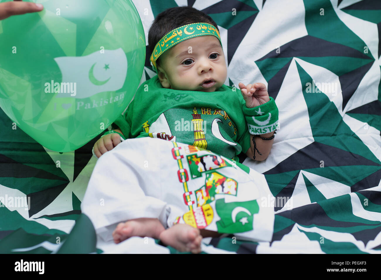 Lahore Pakistan. 07th Aug 2018. Pakistani people celebrating on the eve of 71st Independence Day in Lahore. Streets nationwide brimmed with green and white decorations historical sites were also illum...