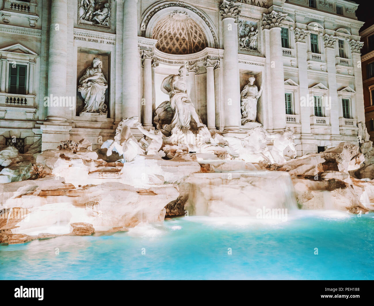 Night at Trevi Fountain with illumination, most famous fountain in Rome, Italy. Stock Photo