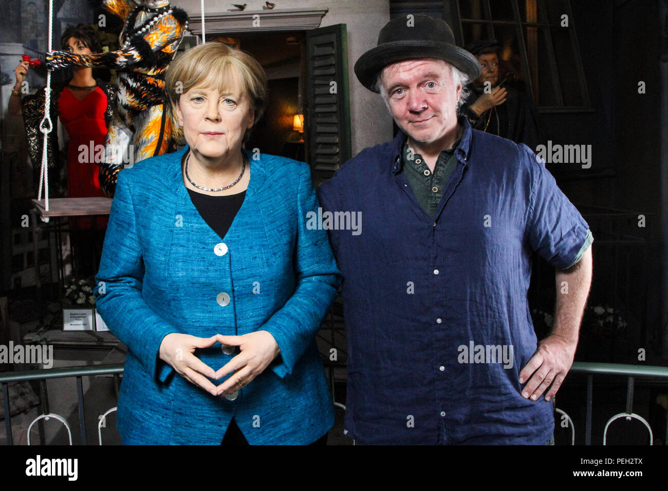 Hamburg, Deutschland. 14th Aug, 2018. Angela Merkel Federal Chancellor and CDU politician stands as a new wax figure in the Panopticon in Hamburg with the sculptor Gottfried Krueger and is to see her 4.Amtszeit, chancellorship from today Tuesday August 14, 2018 in Hamburg Credit: dpa/Alamy Live News Stock Photo