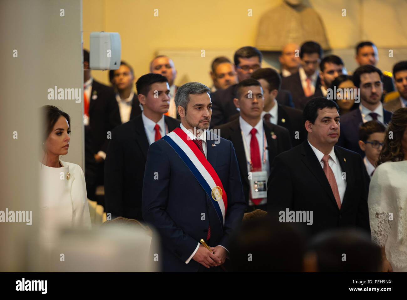 Asuncion, Paraguay. 15th Aug, 2018. Paraguay's first lady Silvana Lopez Moreira (L), new President Mario Abdo Benitez and Vice President Hugo Velazquez attend a Te Deum service at Metropolitan Cathedral of Asuncion following the inauguration ceremony of Paraguay's new President in Asuncion, Paraguay. Credit: Andre M. Chang/ARDUOPRESS/Alamy Live News Stock Photo