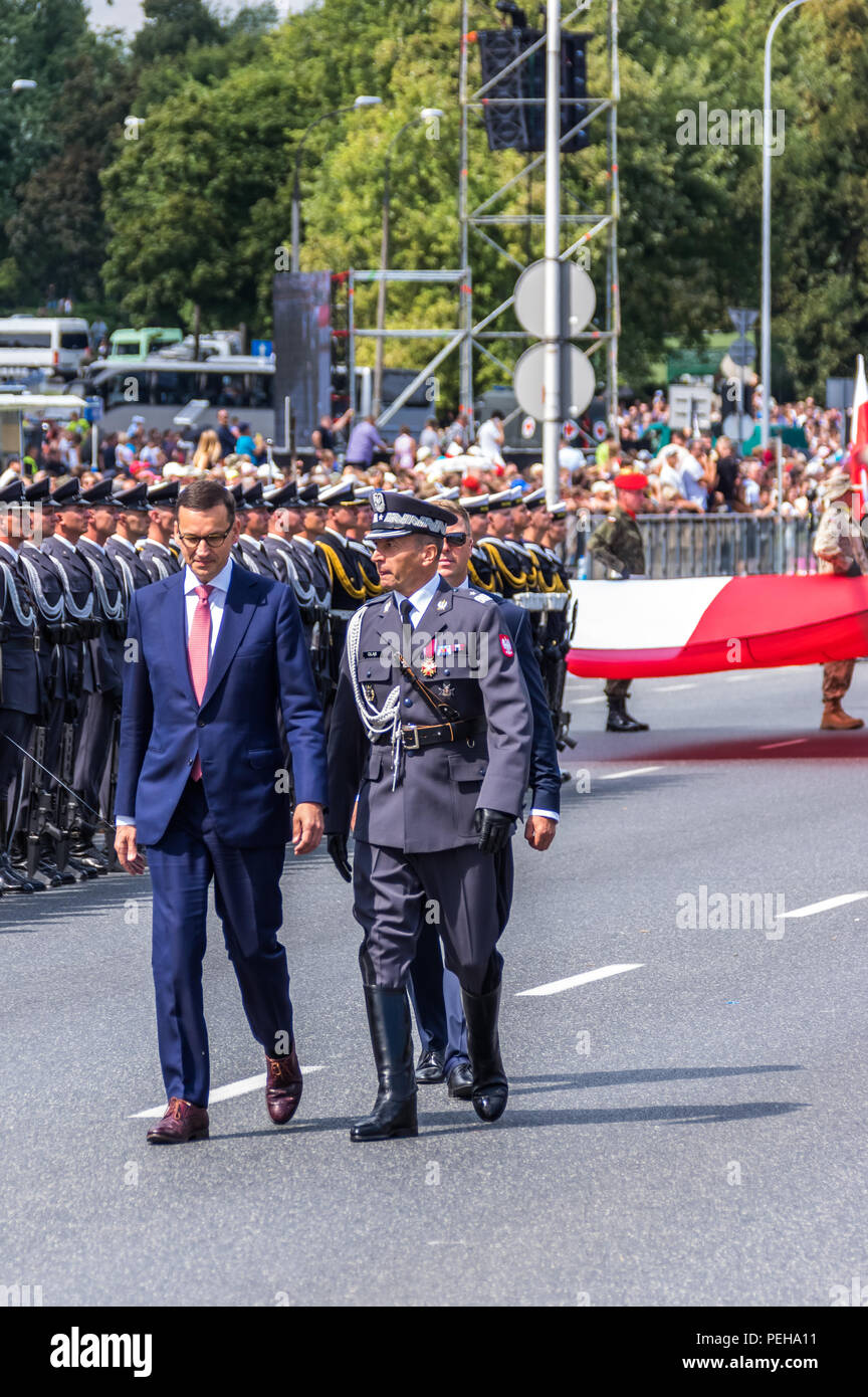 Warsaw, Poland, 15th Aug, 2018: Poland celebrates the annual Armed Forces Day and 98th anniversary of the Battle of Warsaw. Grand Independence Parade with more than 2,000 troops, hundreds re-enactors, different types of military vehicles, more or less 100 planes and helicopters and 100,000 audience took place in the Poland’s capital. Small units from the US, the UK, Croatia and Romania marched together with Polish soldiers. President Andrzej Duda of Poland, Mateusz Morawiecki (PM) and Mariusz Blaszczak (MoD) took part in the event. Credit: dario photography/Alamy Live News. Stock Photo