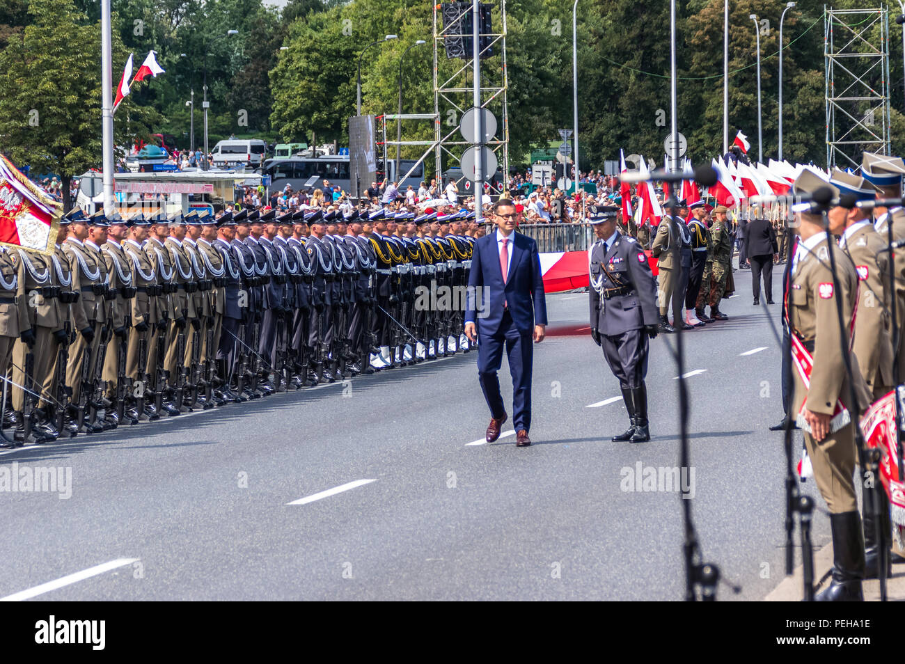 Warsaw, Poland, 15th Aug, 2018: Poland celebrates the annual Armed Forces Day and 98th anniversary of the Battle of Warsaw. Grand Independence Parade with more than 2,000 troops, hundreds re-enactors, different types of military vehicles, more or less 100 planes and helicopters and 100,000 audience took place in the Poland’s capital. Small units from the US, the UK, Croatia and Romania marched together with Polish soldiers. President Andrzej Duda of Poland, Mateusz Morawiecki (PM) and Mariusz Blaszczak (MoD) took part in the event. Credit: dario photography/Alamy Live News. Stock Photo