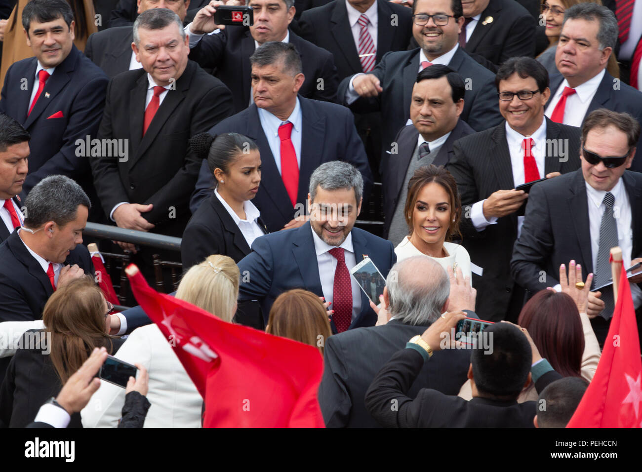 Asuncion, Paraguay. 15th Aug, 2018. Paraguay's president-elect Mario Abdo Benitez and his wife Silvana Lopez Moreira arrive for his swearing-in ceremony at the esplanade of the bay of the Palace of Lopez in Asuncion, Paraguay. Credit: Andre M. Chang/ARDUOPRESS/Alamy Live News Stock Photo