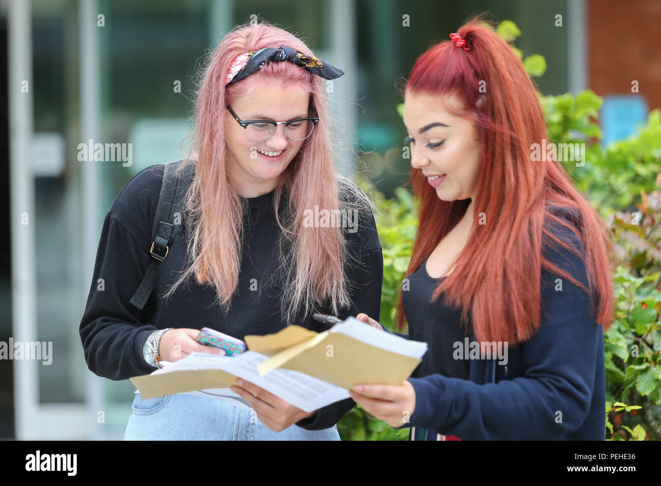 Bromsgrove, Worcestershire, UK. 16th August, 2018. Sixth form students receive their results at North Bromsgrove High School, Bromsgrove, Worcestershire this morning. Peter Lopeman/Alamy Live News Credit: Peter Lopeman/Alamy Live News Stock Photo