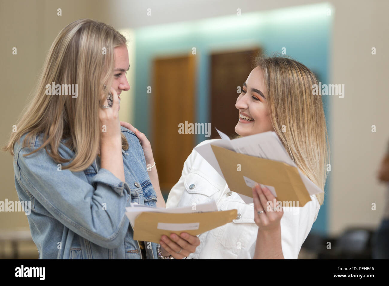 Two young sixth form girls get their A Level results UK 2018 Stock Photo