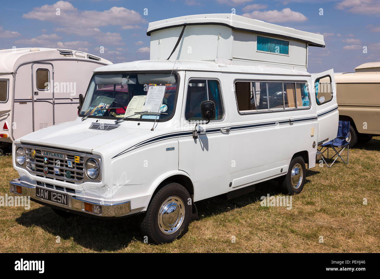 Pop-up roof extension in A 1970s  British Leyland Sherpa 240 Autosleeper motor caravan at an English show in 2018 Stock Photo