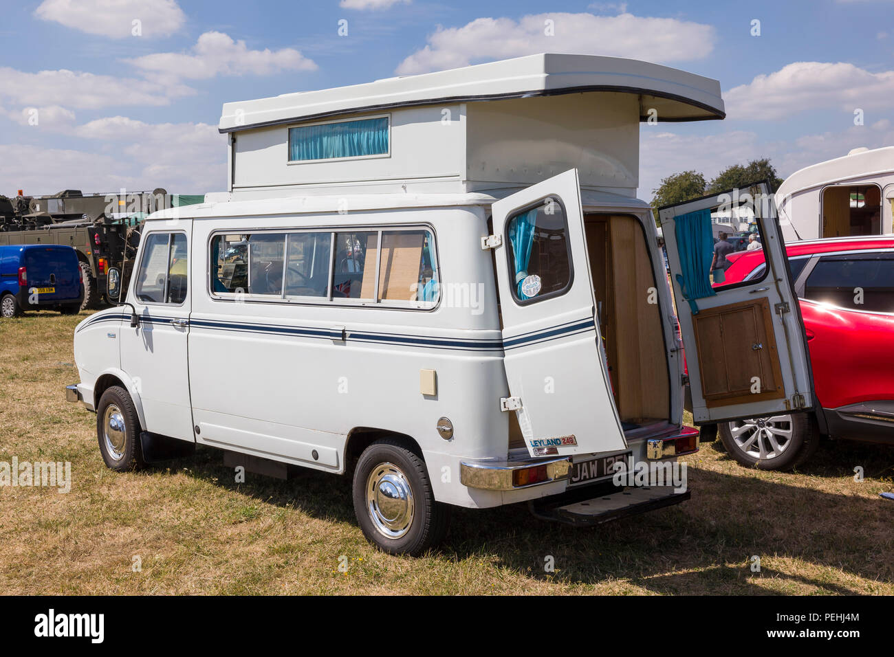Pop-up roof extension in British Leyland Sherpa Autosleeper motor caravan at an English show in 2018 Stock Photo