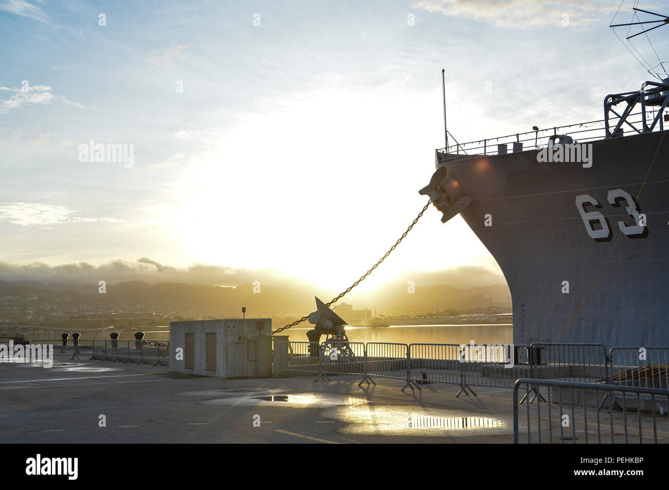 PEARL HARBOR (Aug. 25, 2015) The Battleship Missouri Memorial caught in the early morning light berth on Ford Island at Joint Base Pearl Harbor-Hickam, Aug 25. (U.S. Navy photo by Mass Communication Specialist 1st Class Meranda Keller/Released) (U.S. Navy photo by Mass Communication Specialist 1st Class Meranda Keller/Released) Stock Photo
