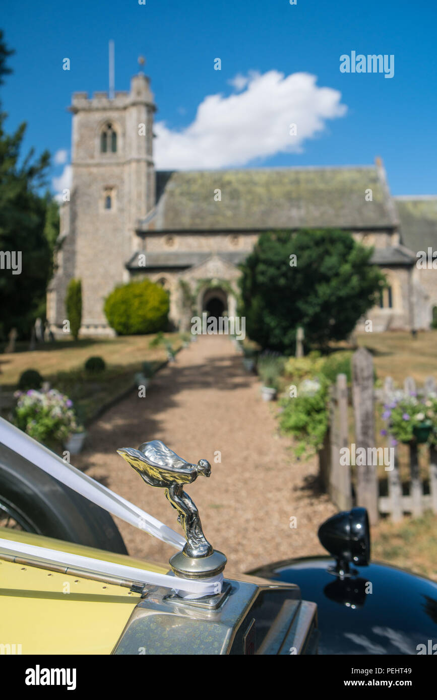 Vintage Rolls Royce wedding car outside an English church Stock Photo