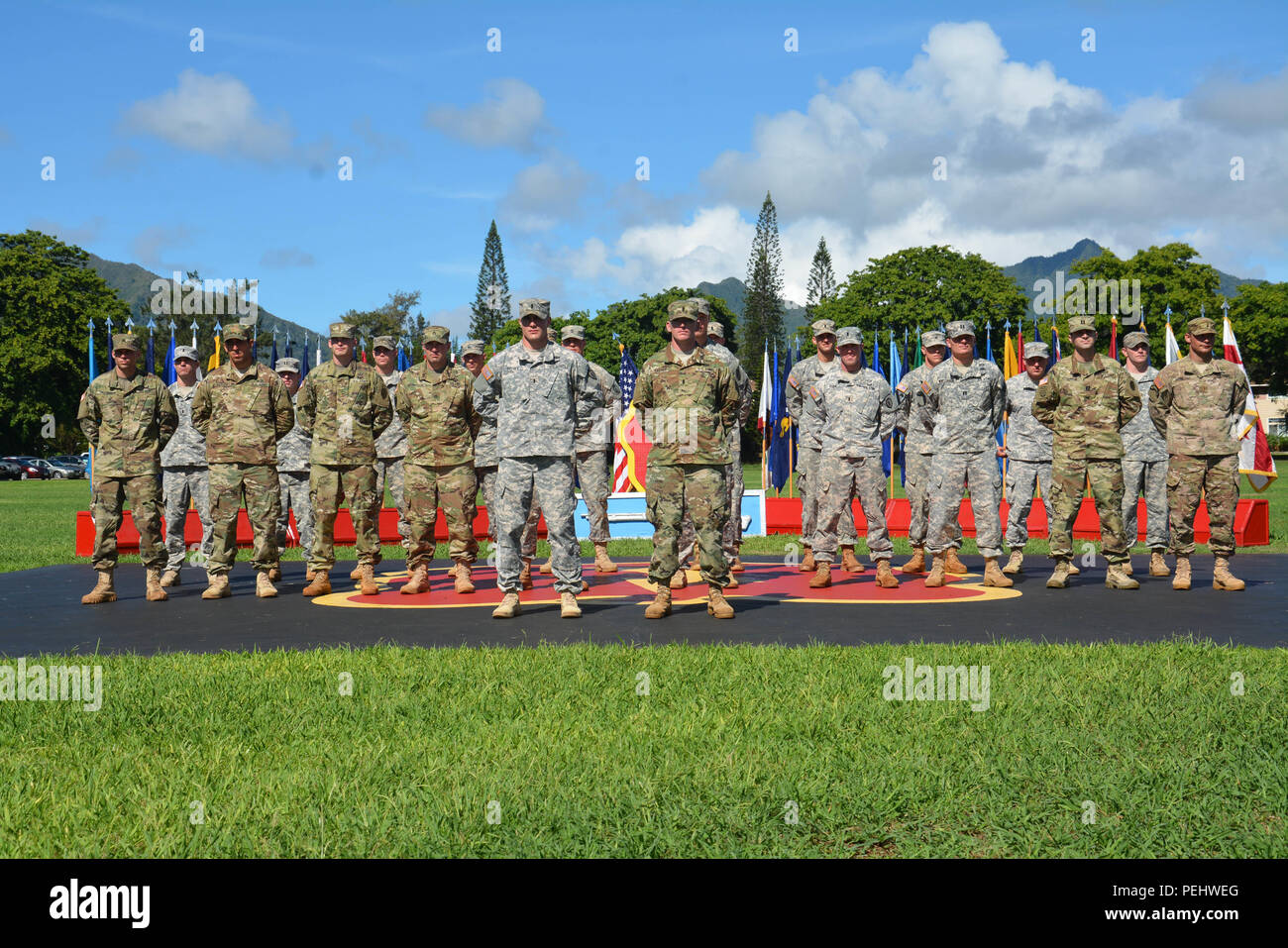 Twenty-two Expert Infantryman Badge (EIB) candidates were the first to test and receive EIBs in the Army under the new EIB standards Aug. 28 on Schofield Barracks. The awardees who exceeded course standards by receiving first time go on all events were: 1st Lt. Robert Doyle (front left), an infantry officer assigned to 1st Battalion, 21st Infantry Regiment, 2nd Stryker Brigade Combat Team, 25th Infantry Division, 1st Lt. Jonathan Kaicher (front right), an infantry officer assigned to 1st Battalion, 27th Infantry Regiment, 2SBCT. (U.S. Army photo by Staff Sgt. Carlos Davis, 2nd Stryker Brigade  Stock Photo