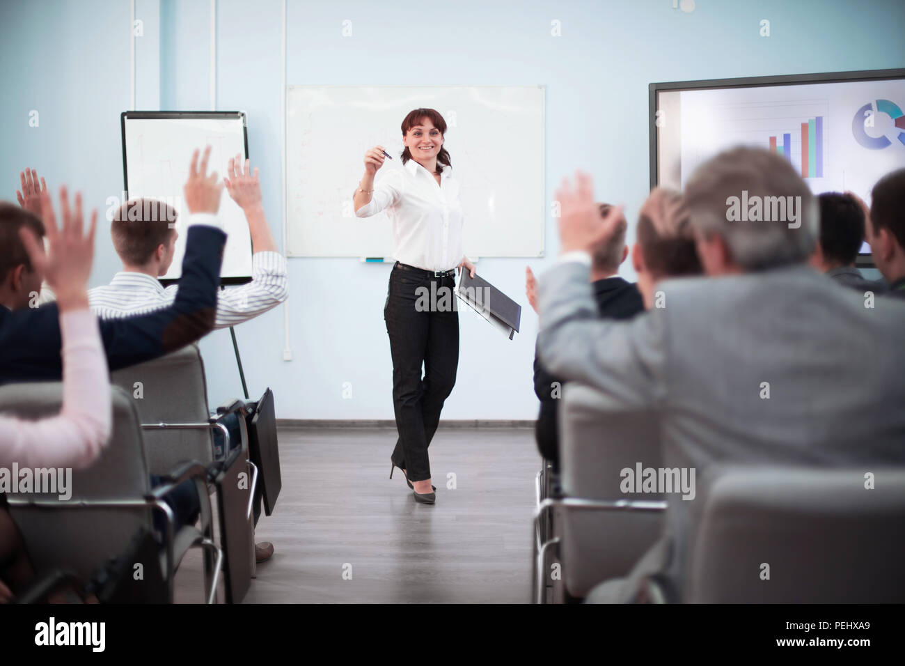 Students audience raising hands hi-res stock photography and images - Alamy