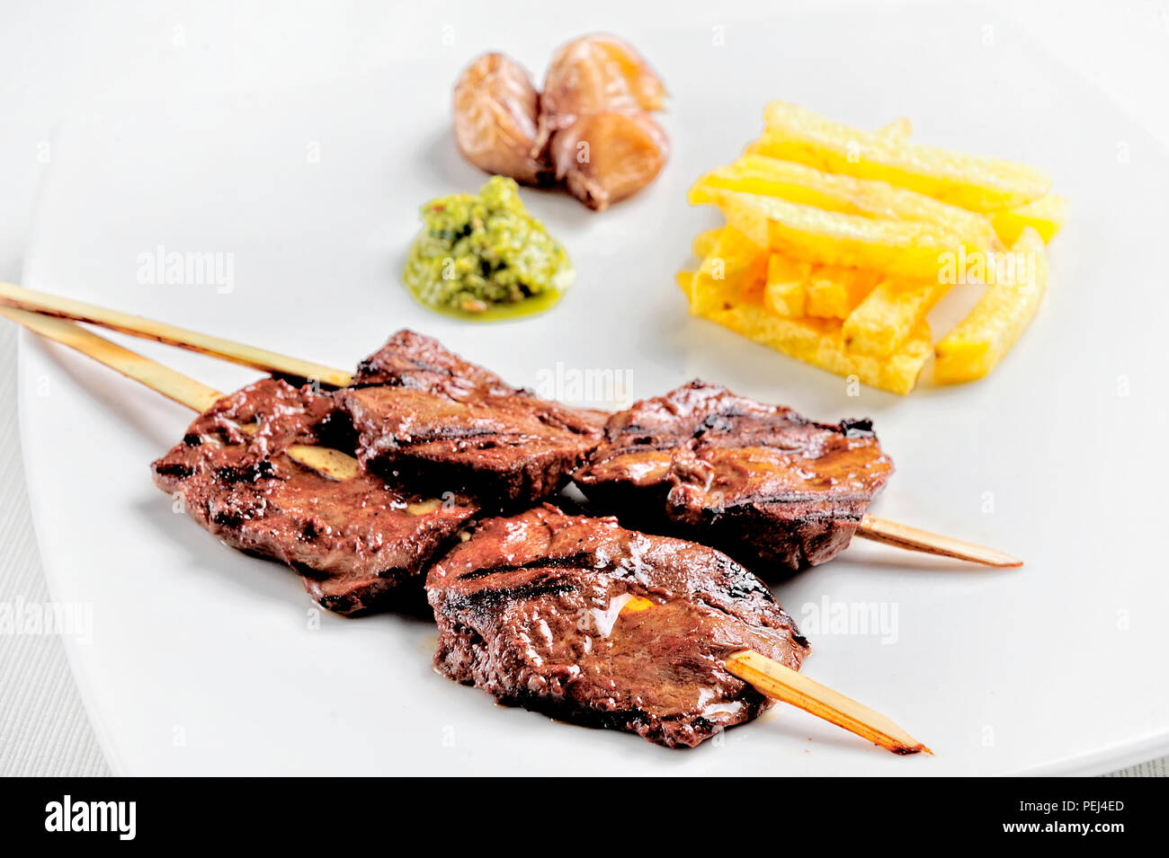 anticuchos, Peruvian cuisine, grilled skewered beef heart meat with