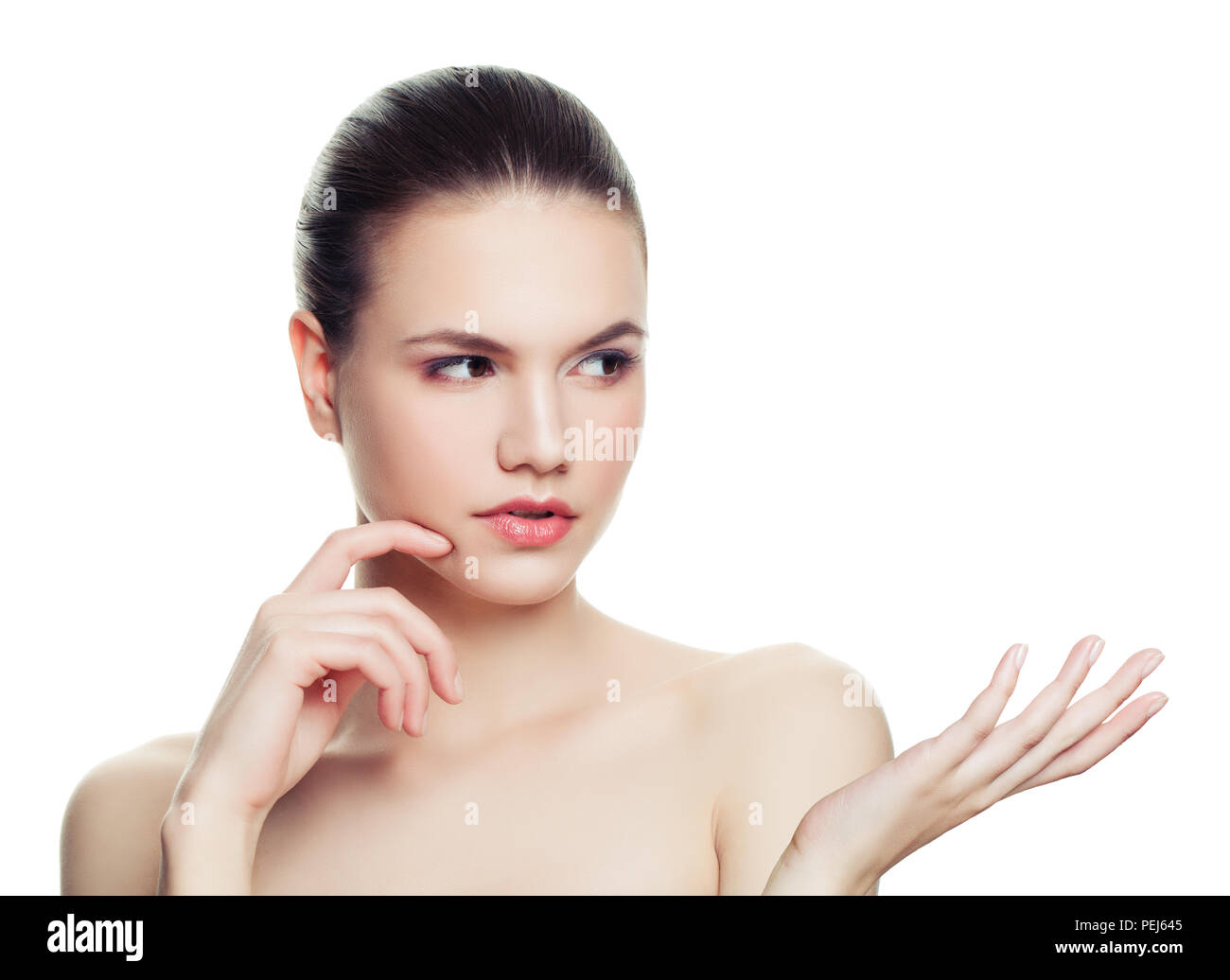 Thinking woman showing empty copy space on the open hand isolated on ...