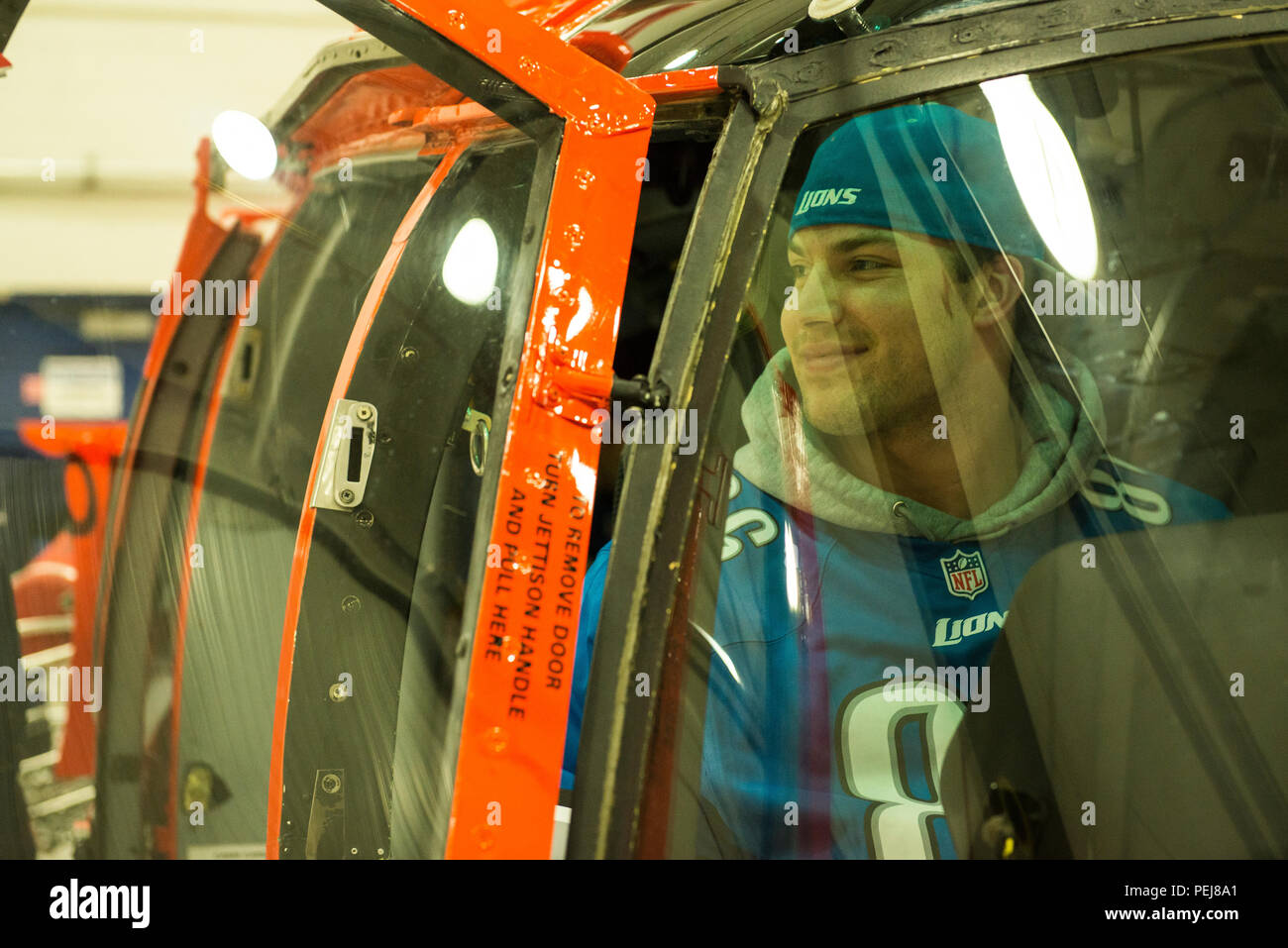 Casey Pierce, a rookie tight end for the Detroit Lions, tries his hand in the cockpit of a