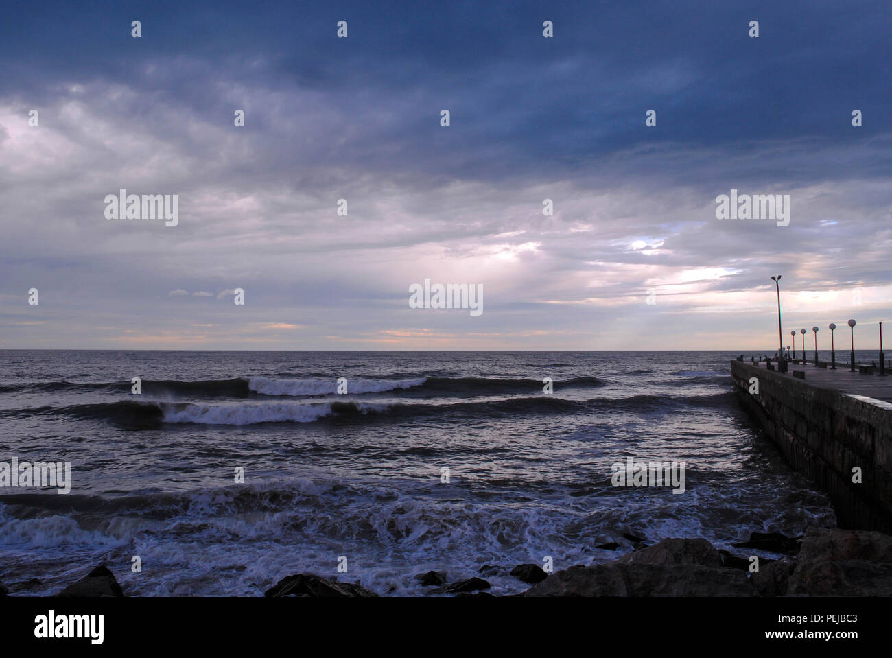 View of a windy sky above the sea Stock Photo - Alamy