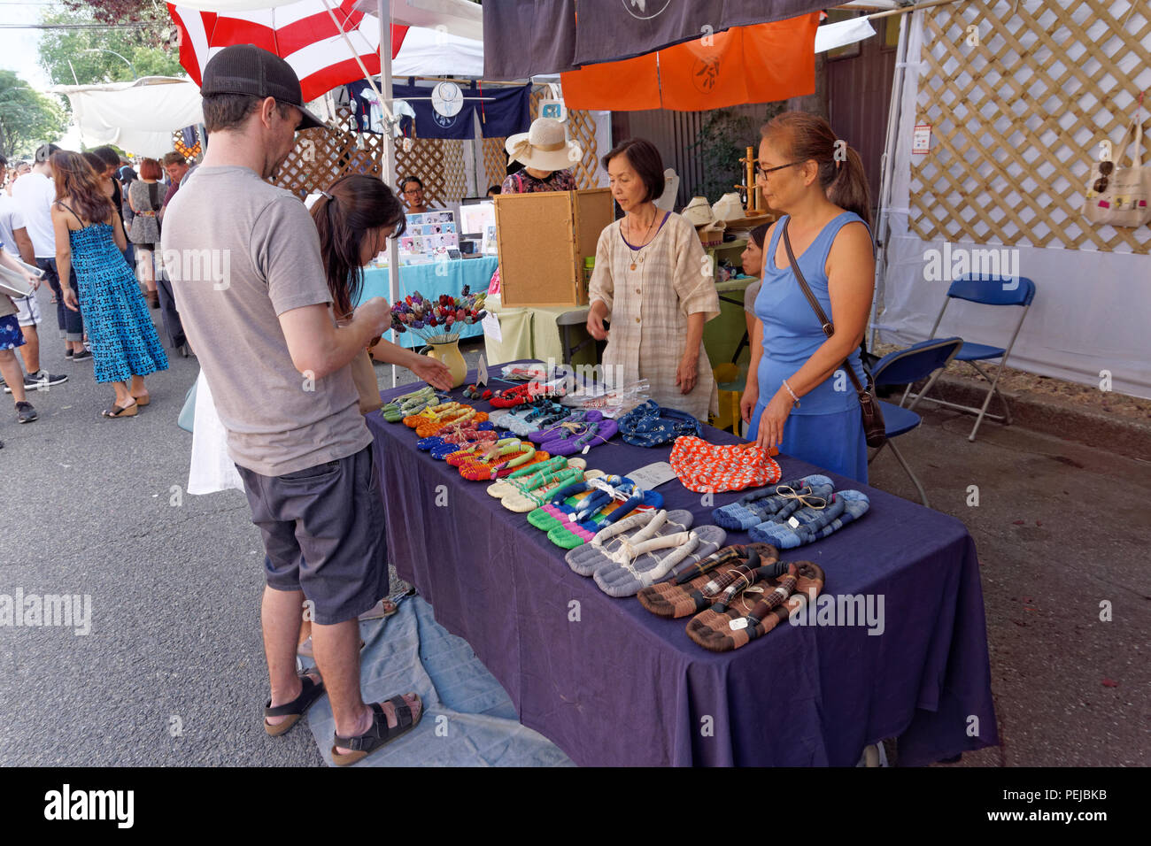 Women Selling Traditional Japanese Cloth Sandals Or Nuno Zori For Sale At The 18 Annual Powell Street Festival In Japantown Vancouver Canada Stock Photo Alamy
