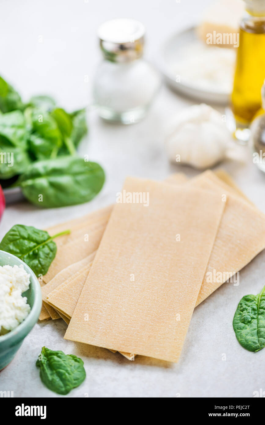 Ingredients for Vegetarian Spinach and Ricotta Lasagna, grey background Stock Photo Alamy