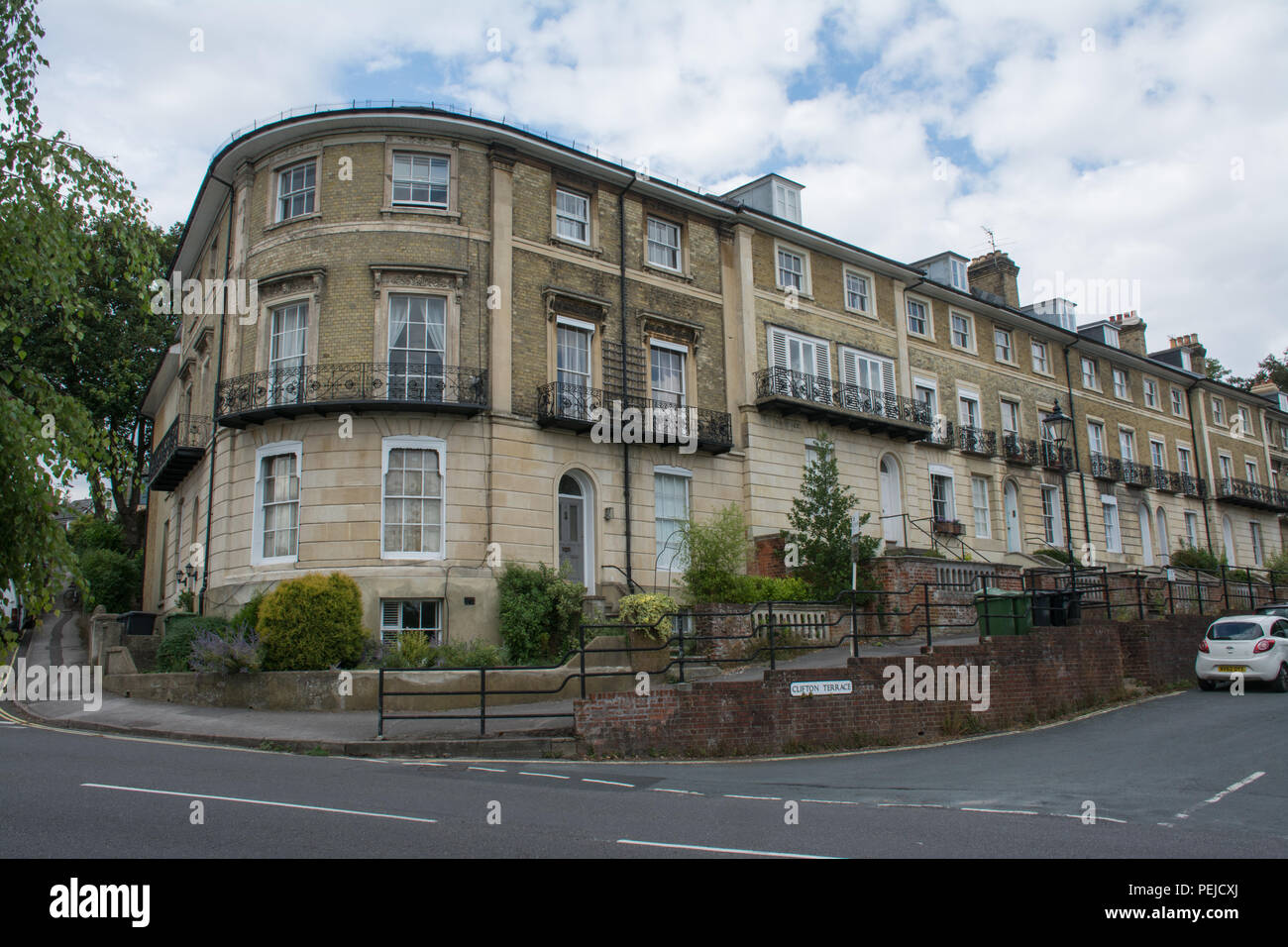 Historic regency terraced townhouses in Clifton Terrace near the city centre of Winchester, Hampshire, UK Stock Photo