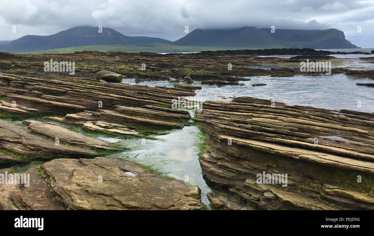 View of Warbeth Bay looking toward Island of Hoy in Orkney Stock Photo