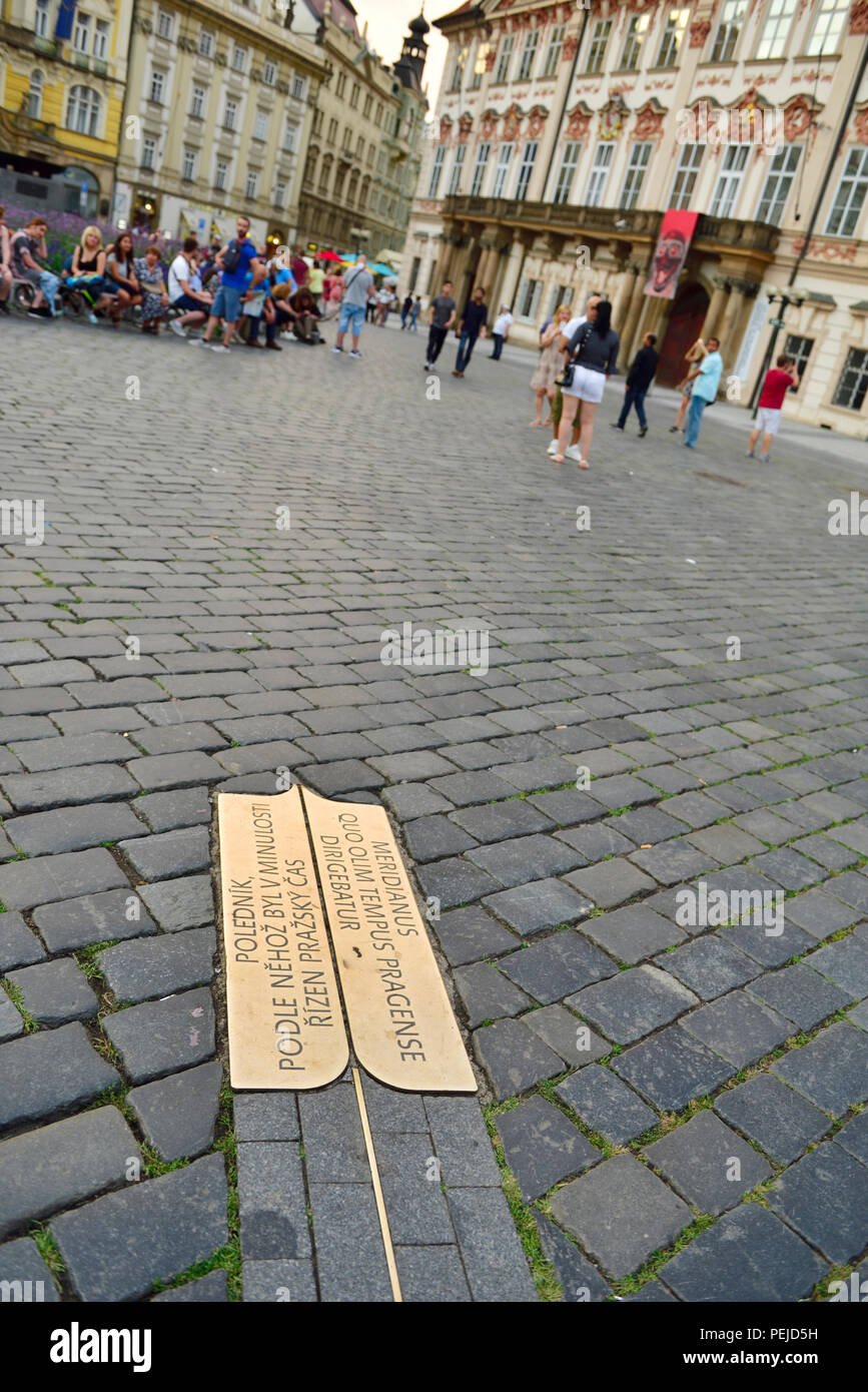 Prague Old Town Square pavement with Prague Meridian marker from 1652 to tell midday noon time, Czech Republic Stock Photo