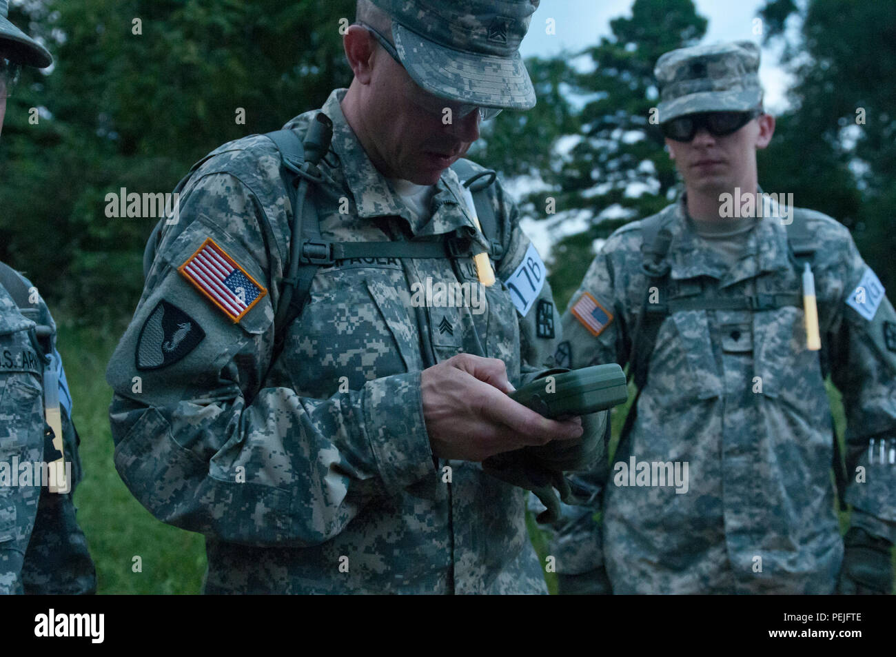 U.S. Army Reserve Sgt. Michael Dipaola, combat engineer, 680th Engineer Company out of Webster, N.Y., inputs coordinates in a Defense Advanced GPS Receiver before his team moves to find their points during the land navigation portion of Sapper Stakes 2015 at Fort Chaffee, Ark., Aug. 30. (U.S. Army photo by Staff Sgt. Debralee Best) Stock Photo