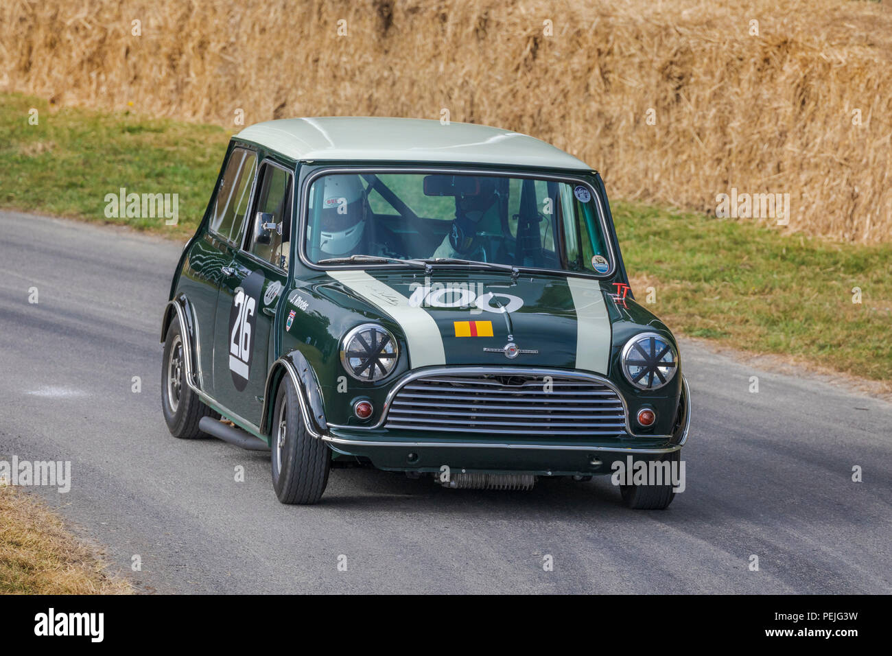 1965 Morris Mini Cooper BSCC racer with driver Charles Rainford at the 2018 Goodwood Festival of Speed, Sussex, UK. Stock Photo