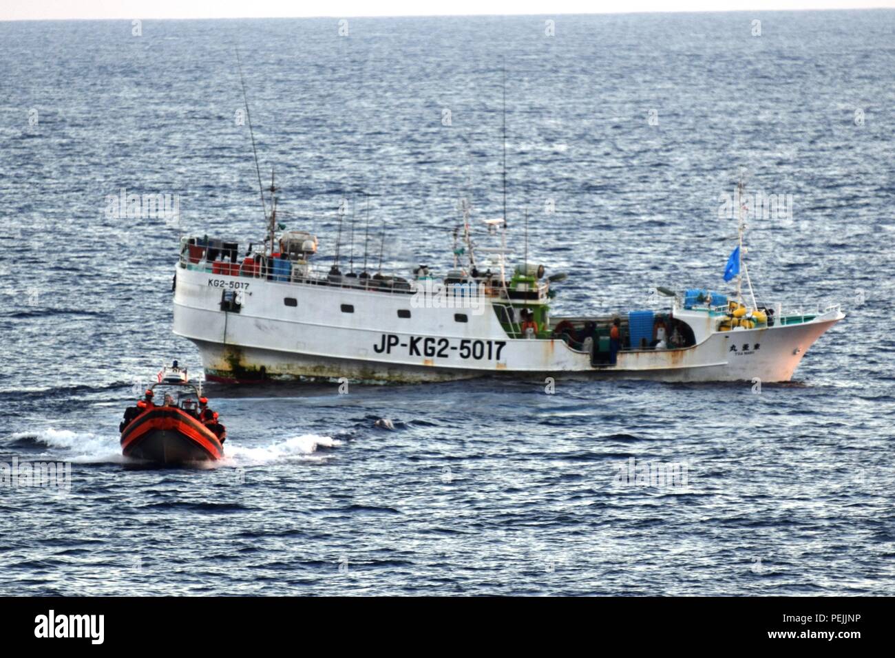 A Coast Guard Cutter Sequoia (WLB 215) boarding team along with an