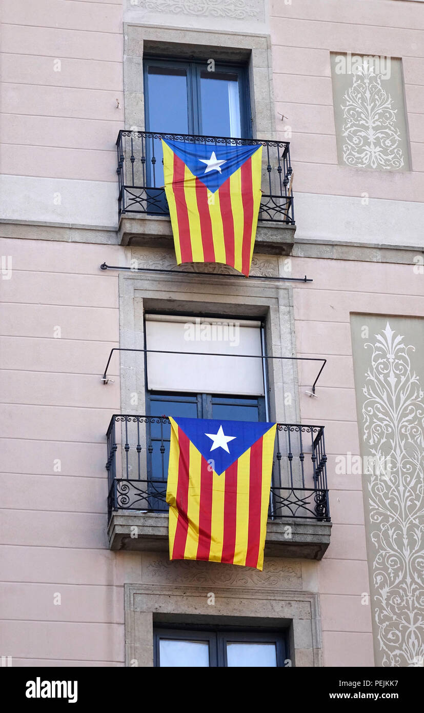 Catalan National Flags On Apartment Balconies In Barcelona Spain, In Support Of An Independent Catalonia Stock Photo