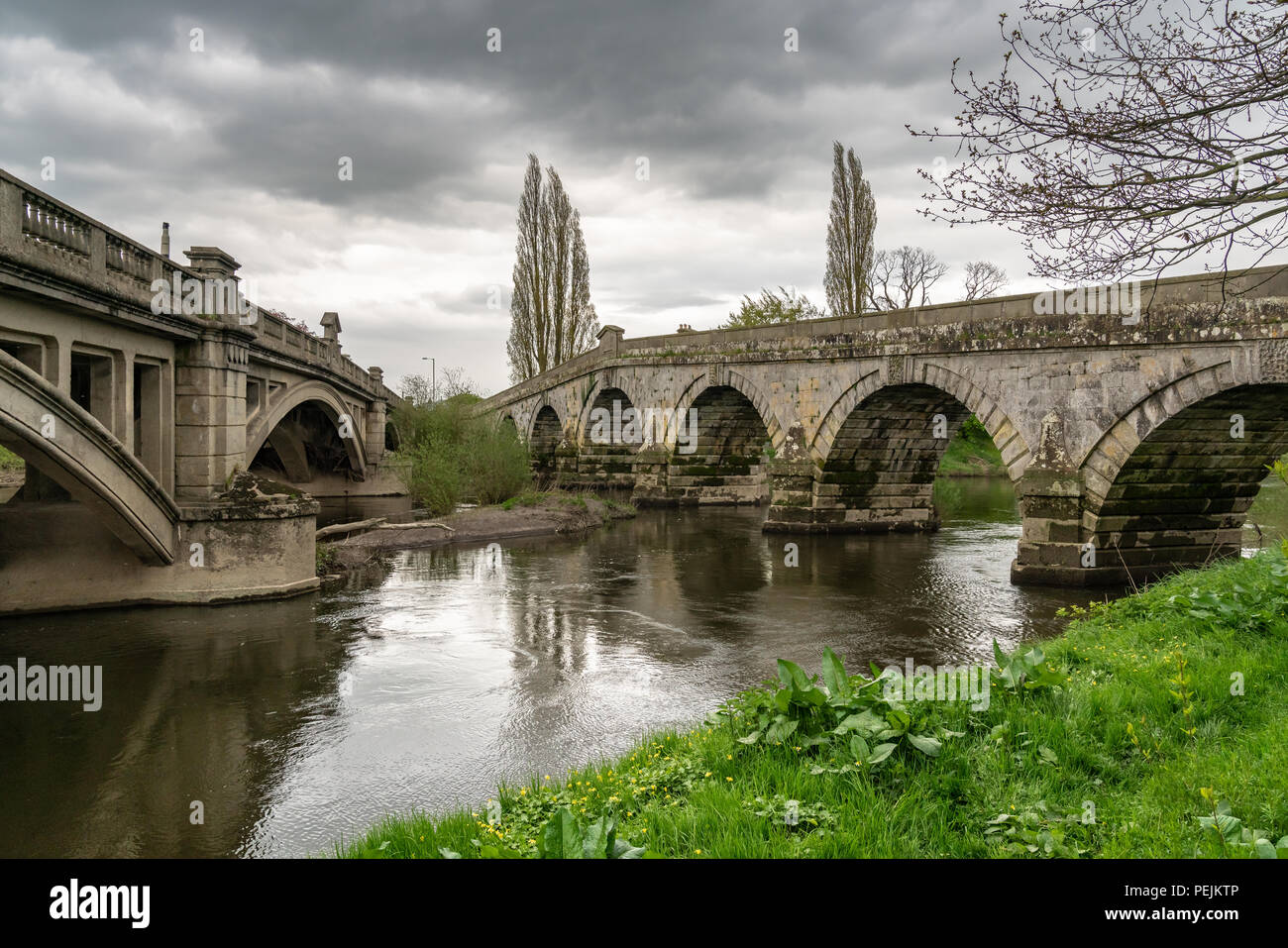The old bridge and Atcham Bridge over the River Severn in Atcham, near Shrewsbury, Shropshire, England, UK Stock Photo
