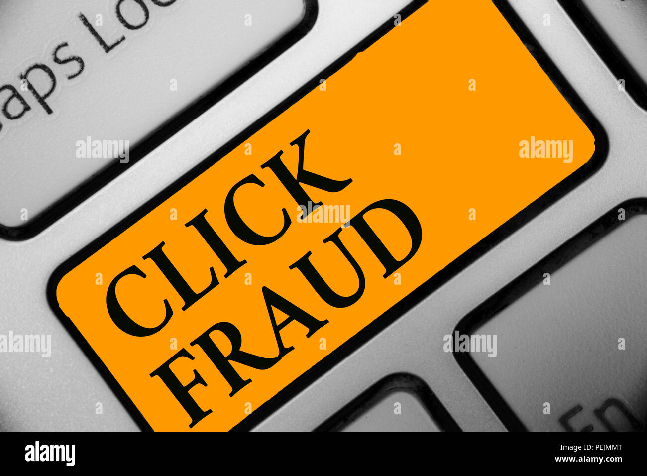 Writing note showing Click Fraud. Business photo showcasing practice of repeatedly clicking on advertisement hosted website Keyboard orange key Intent Stock Photo