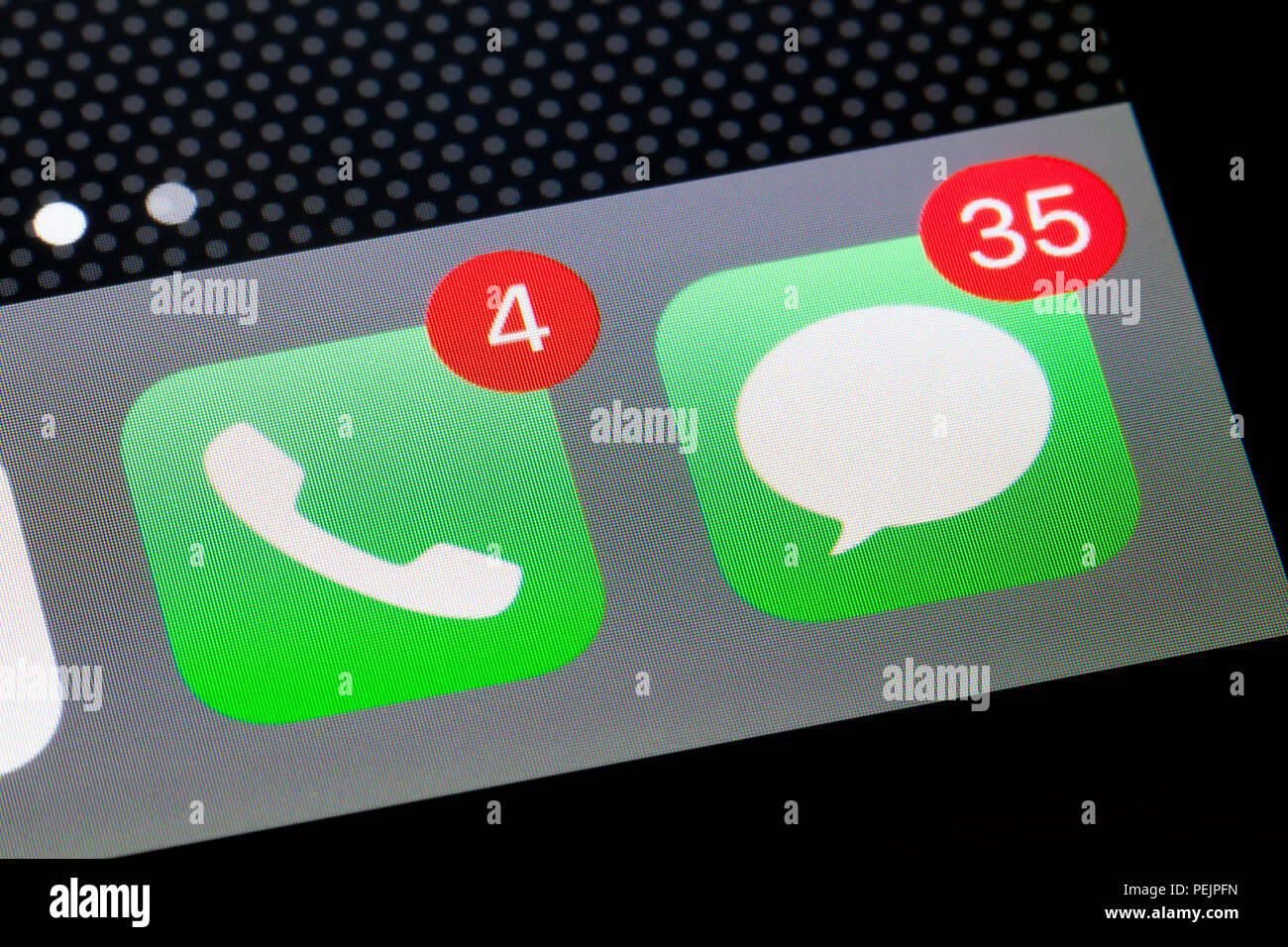 iPhone Phone and Messages icons showing missed calls notification badge (badges) - USA Stock Photo