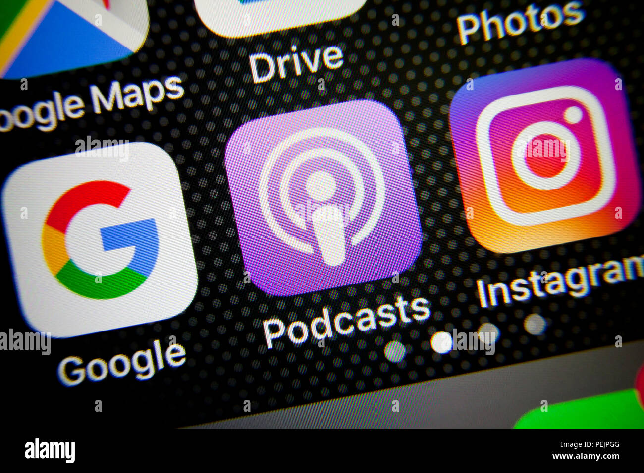 Apple Podcasts app icon on iPhone screen - USA Stock Photo