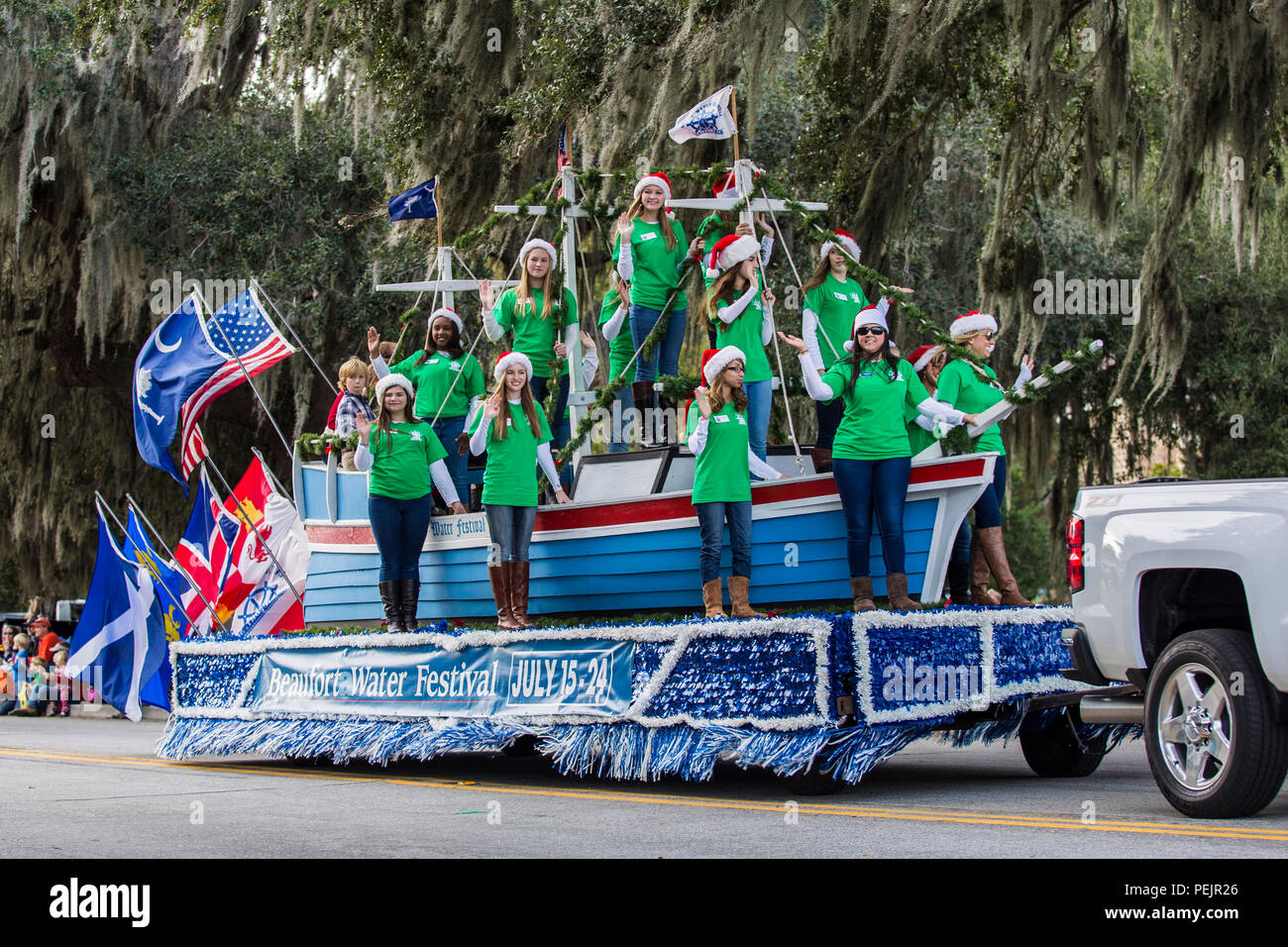 Beaufort residents wave to the crowd during the Beaufort Christmas