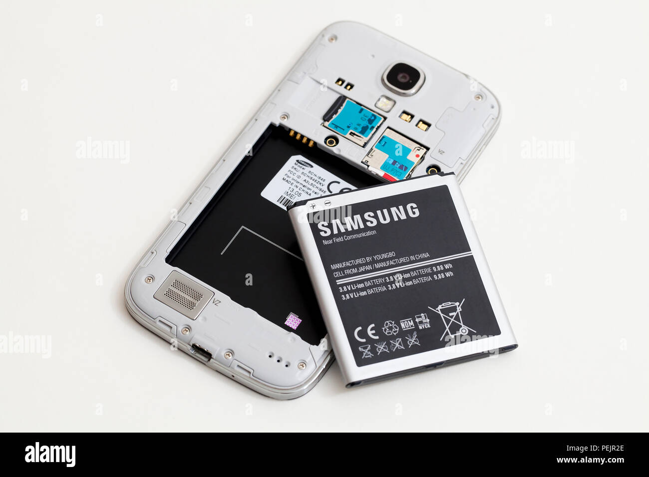 Samsung Galaxy mobile phone with back cover removed, showing Samsung battery - USA Stock Photo